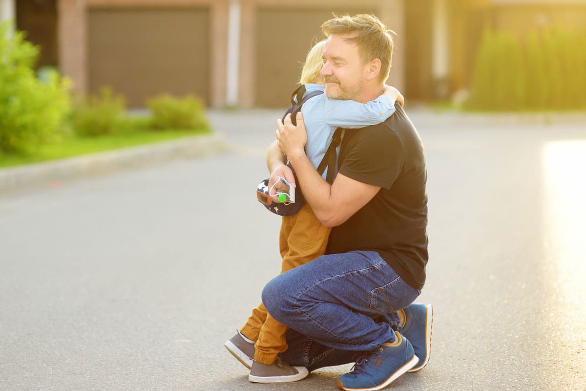 Father and son hugging