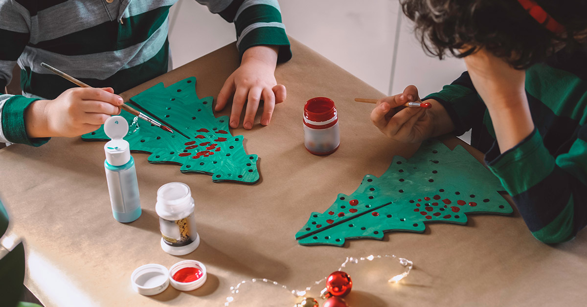 stressed out dad holding daughter and laundry basket