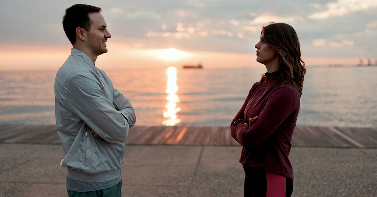 divorced couple talking outside