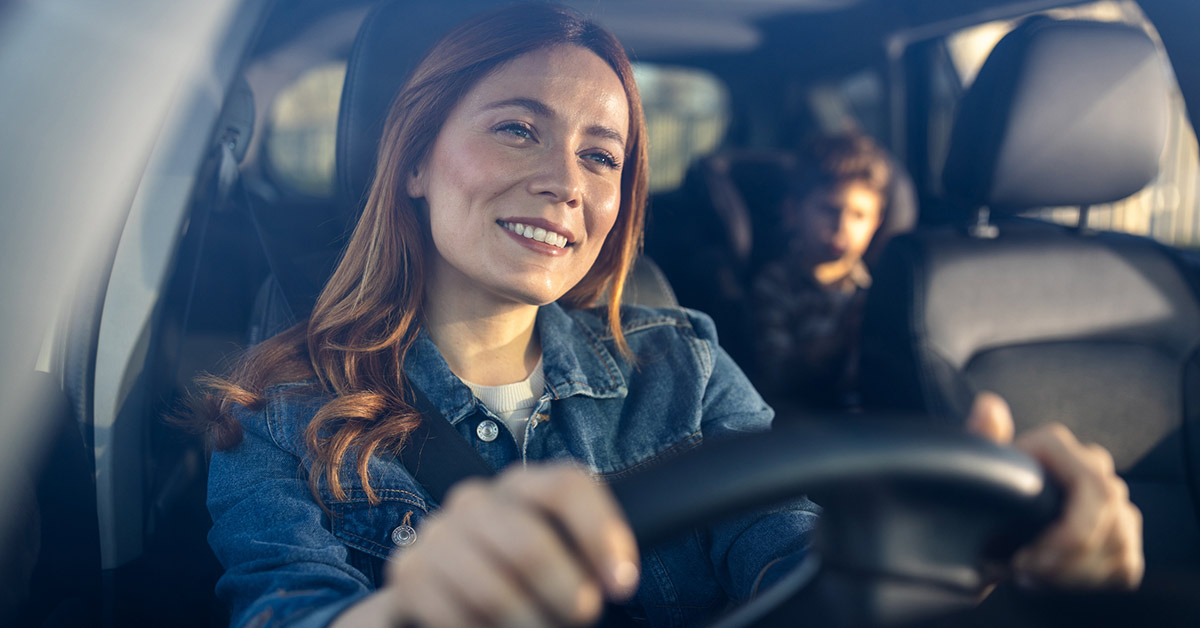 parent driving kid to school